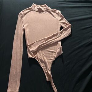 cream peach tong body suit